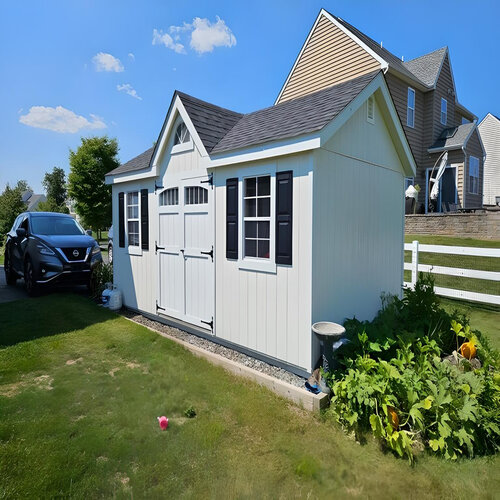 Amish-built wooden shed available for rent-to-own in a residential backyard